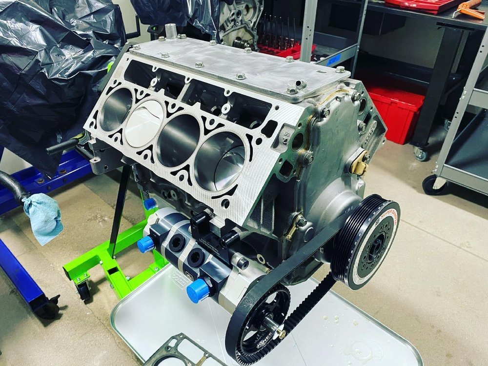 Bare LS-style engine block on a stand