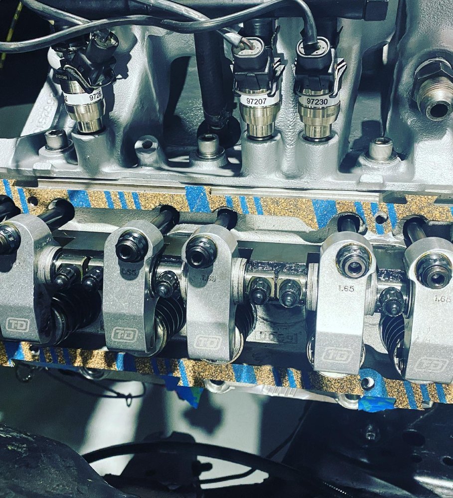 Close-up of cylinder head and valve train during an engine build